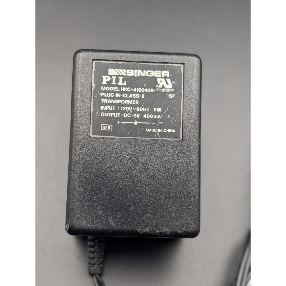 PIL HKC419040 Input: 120VAC 60Hz 8W Output: 9VDC 400mA For Singer Sewing Machine